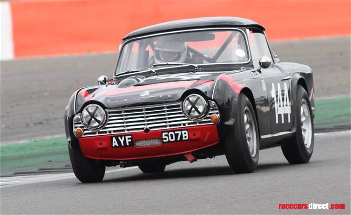 sold-1964-triumph-tr4-fia-race-car