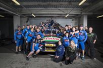 The winning team, car and trophy