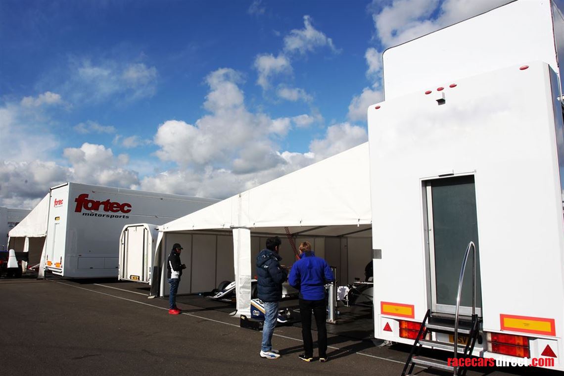 two-formula-car-or-hospitality-transporter