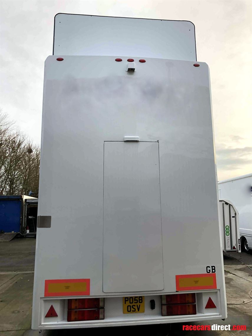 two-formula-car-or-hospitality-transporter