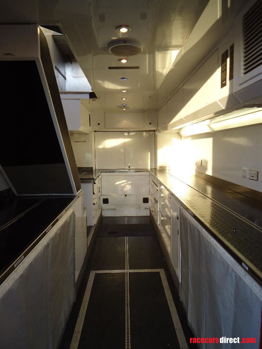 two-formula-car-or-hospitality-transporter