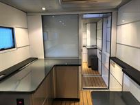 two-formula-car-or-hospitality-transporter