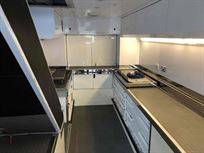 two-formula-car-or-hospitality-transporter