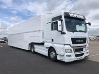 two-formula-car-or-hospitality-transporter