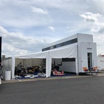 two-formula-car-or-hospitality-transporter