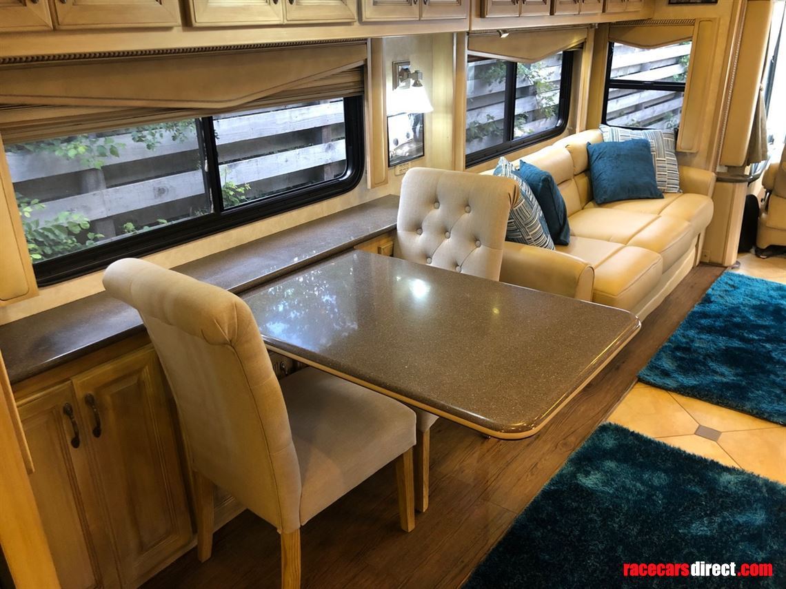 Extendable dining table, extra chairs available. Makes for a comfy office.