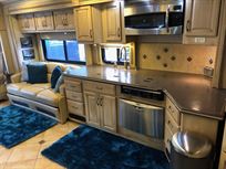 Kitchen area with microwave / oven, and dishwasher