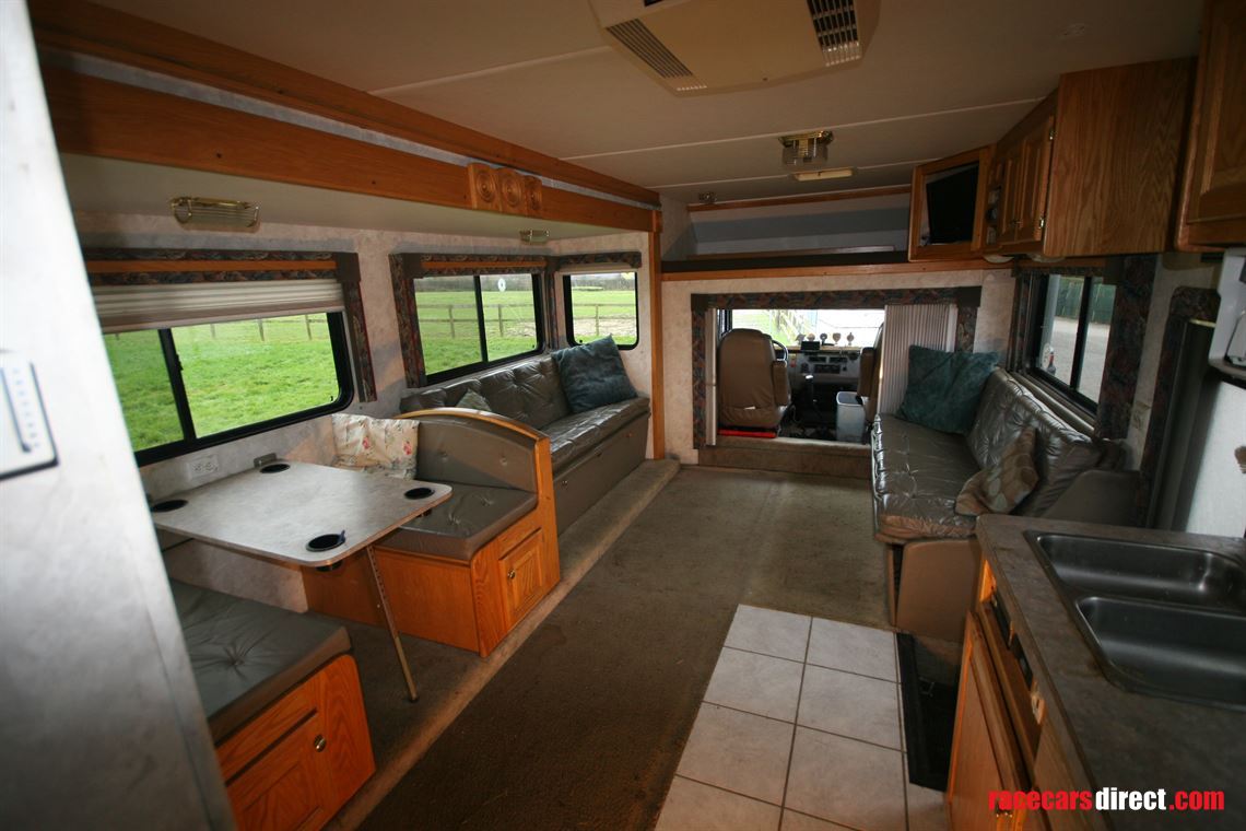 freightliner-motorhome-and-trailer