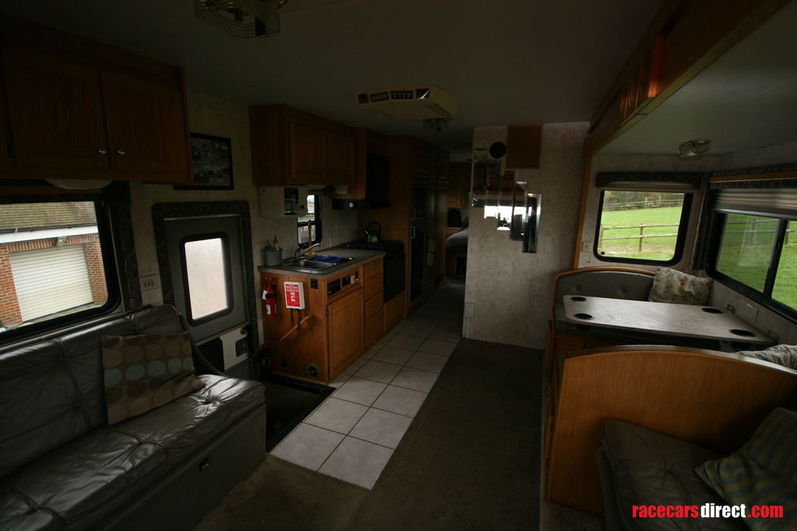 freightliner-motorhome-and-trailer