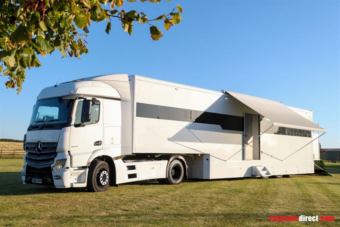 custom-built-tri-axel-step-trailer-with-luxur