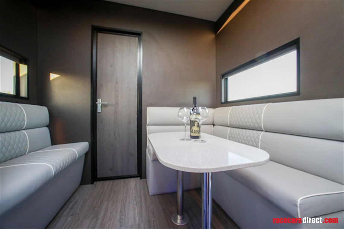 custom-built-tri-axel-step-trailer-with-luxur