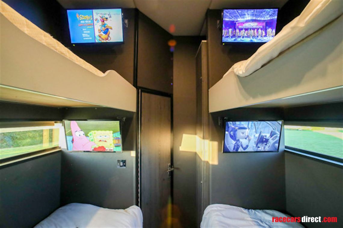 custom-built-tri-axel-step-trailer-with-luxur