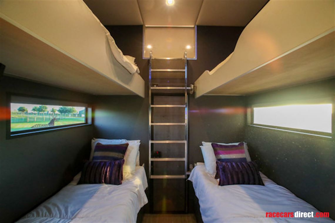 custom-built-tri-axel-step-trailer-with-luxur