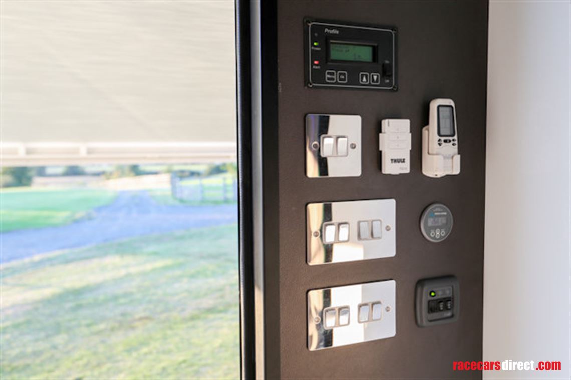 custom-built-tri-axel-step-trailer-with-luxur