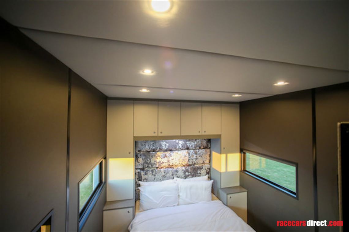 custom-built-tri-axel-step-trailer-with-luxur