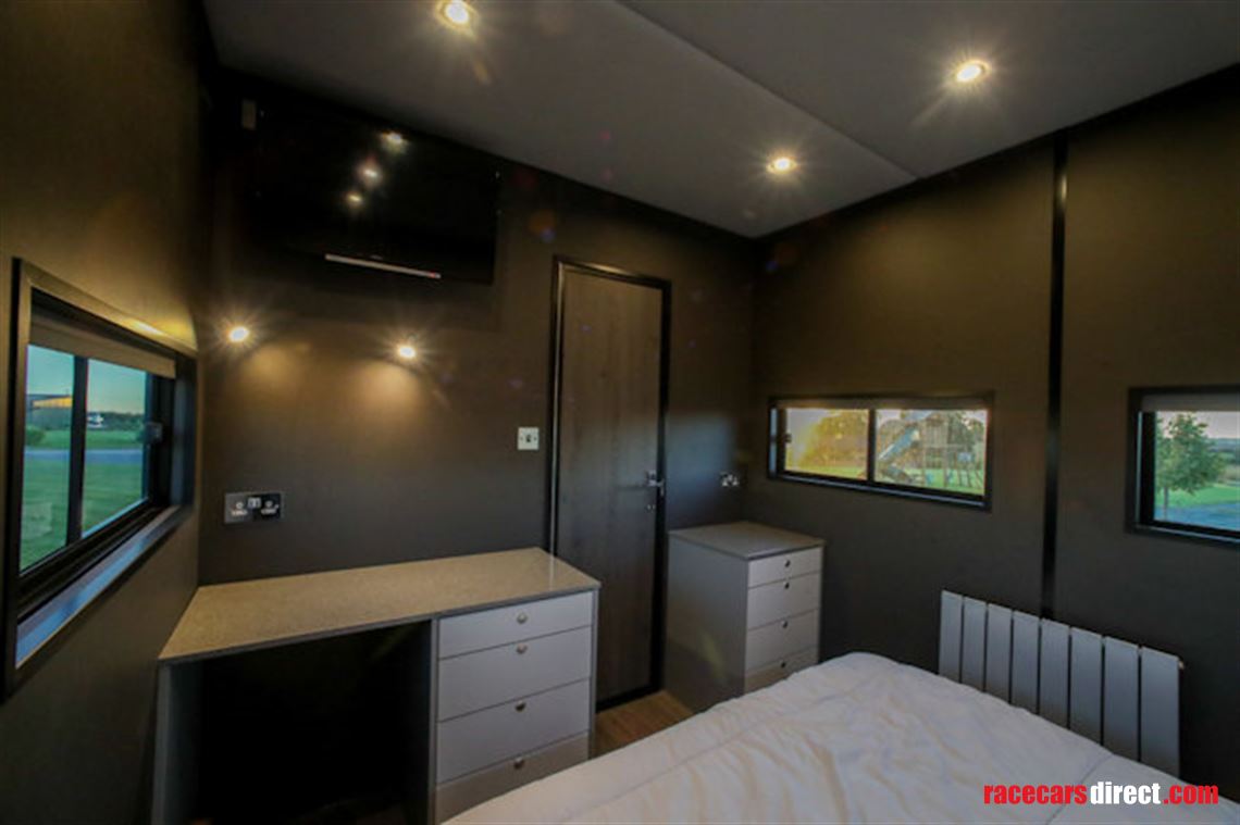 custom-built-tri-axel-step-trailer-with-luxur