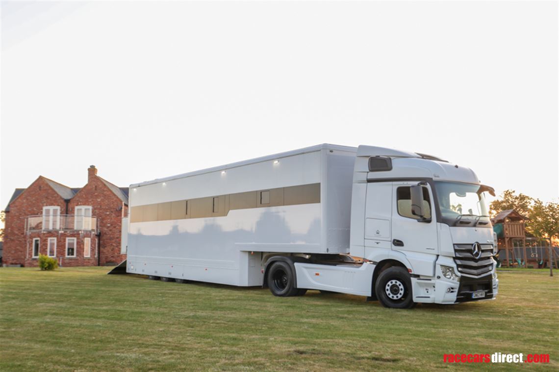 custom-built-tri-axel-step-trailer-with-luxur