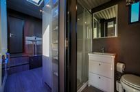 custom-built-tri-axel-step-trailer-with-luxur