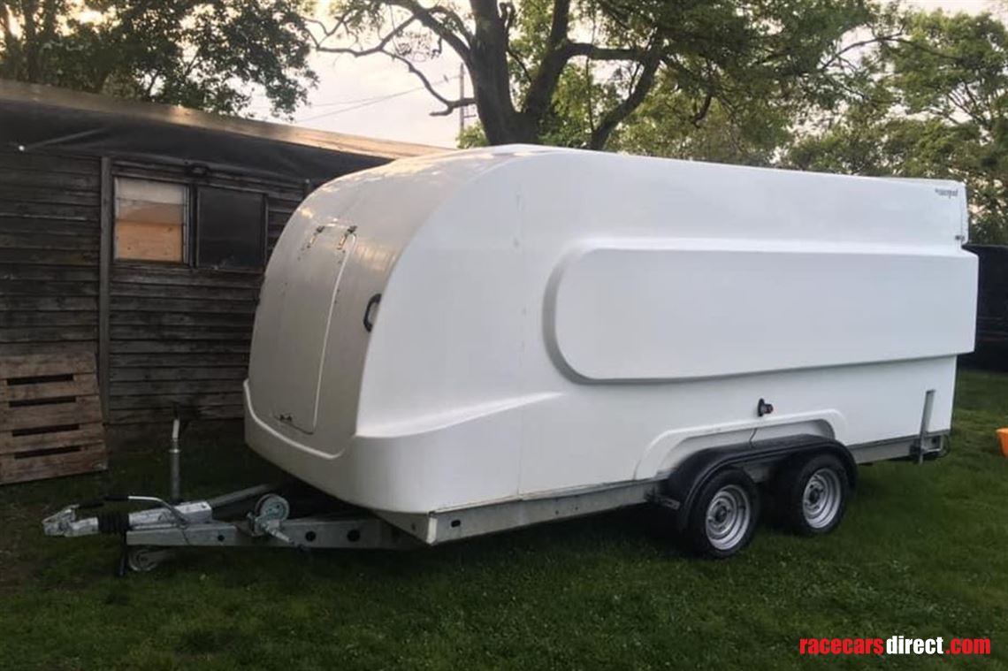 formula-race-pod-covered-car-transport-traile