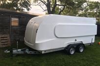 formula-race-pod-covered-car-transport-traile