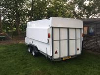 formula-race-pod-covered-car-transport-traile