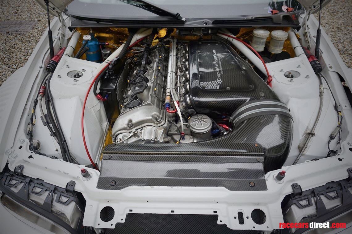 Gold lined engine bay. Butler S54 engine, rebuilt for 2021.