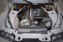 Gold lined engine bay. Butler S54 engine, rebuilt for 2021.