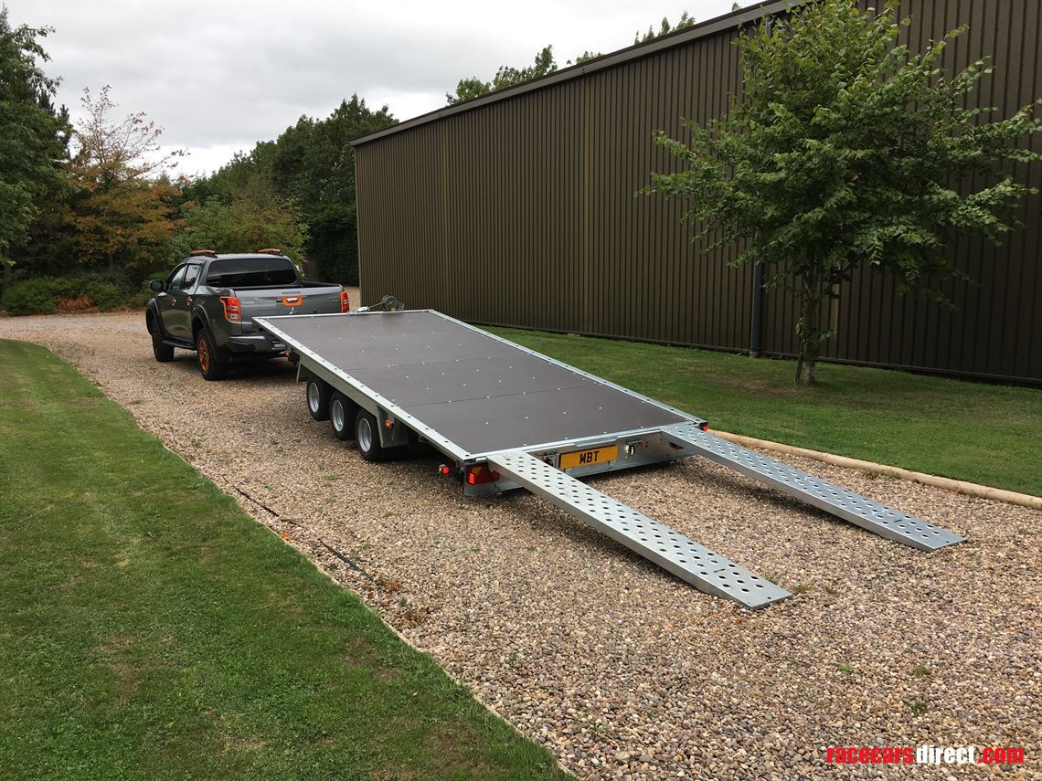 flatbed-car-trailer-18x73-tri-axle-with-tilt