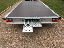 flatbed-car-trailer-18x73-tri-axle-with-tilt