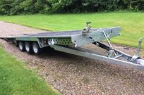 flatbed-car-trailer-18x73-tri-axle-with-tilt