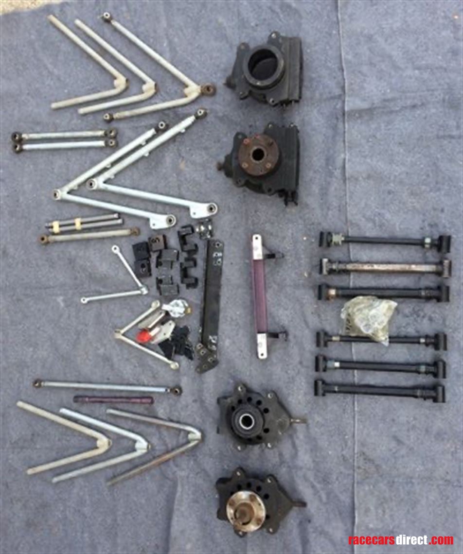 Susp & spare uprights for either car