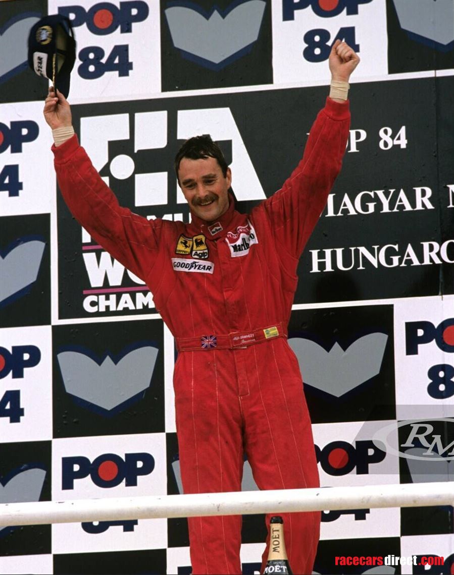 Nigel Mansell celebrates his victory at the Hungaroring on 13 August 1989. Formula One Pictures / John Townsend 2010