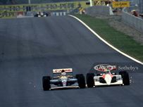 Nigel Mansell in his Williams FW14 battles wheel to wheel with Ayrton Senna in his McLaren MP4/6 to lead the 1991 Spanish Grand Prix. Courtesy of the Girardo & Co. Archive
