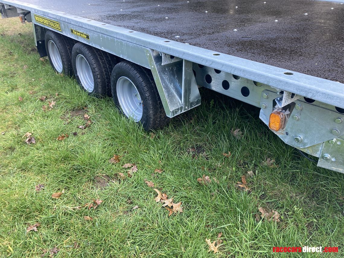 18---5500mm-flatbed-trailer-tilt-and-tri-axle