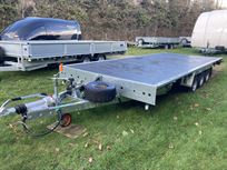 18---5500mm-flatbed-trailer-tilt-and-tri-axle
