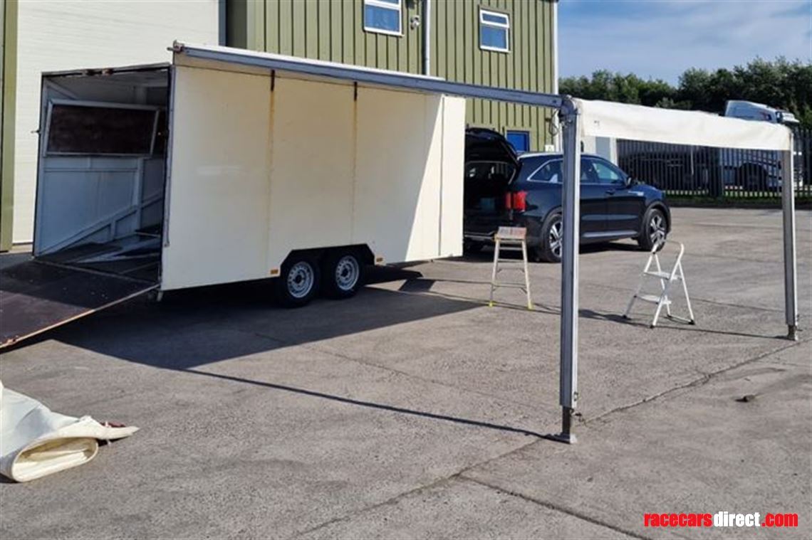 covered-tilt-bed-trailer-with-awning