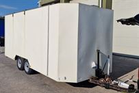 covered-tilt-bed-trailer-with-awning