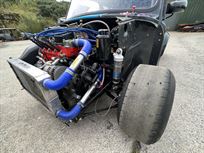 mini-miglia-racecar-front-running-car