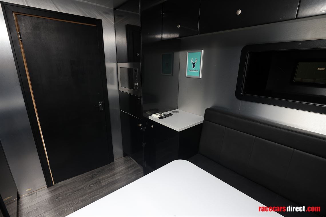 man-tgx-2-car-transporter-with-office-and-6m