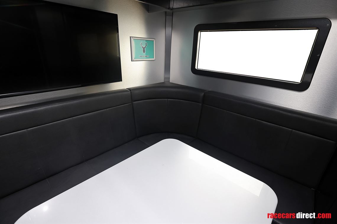 man-tgx-2-car-transporter-with-office-and-6m