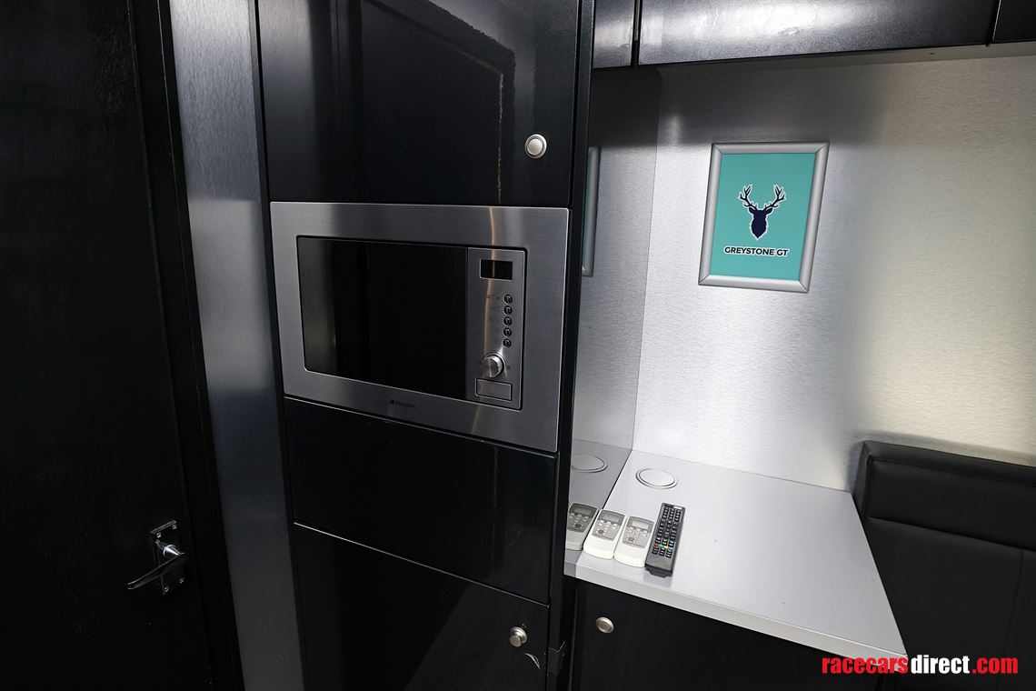 man-tgx-2-car-transporter-with-office-and-6m