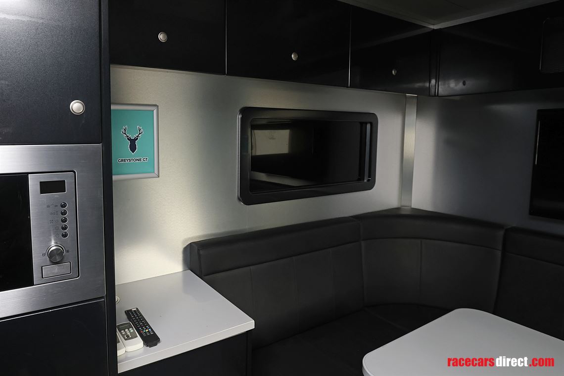 man-tgx-2-car-transporter-with-office-and-6m