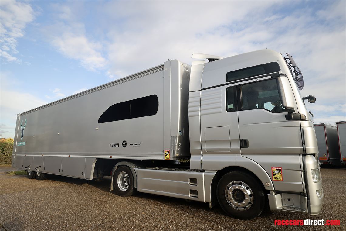 man-tgx-2-car-transporter-with-office-and-6m