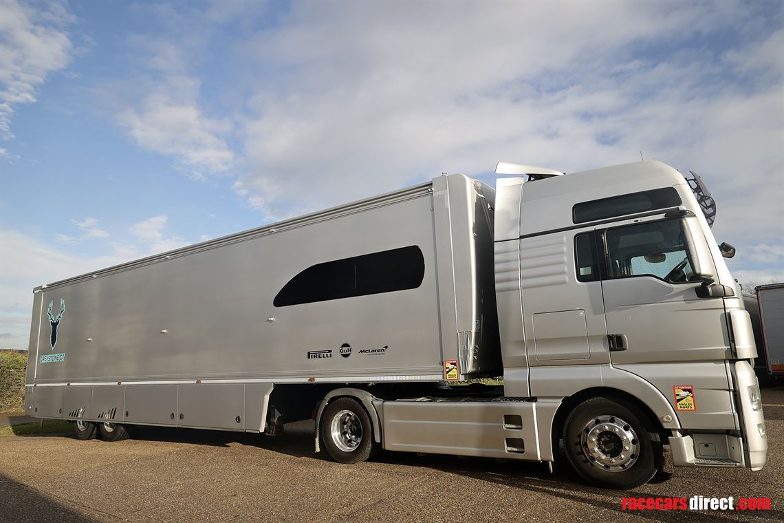 man-tgx-2-car-transporter-with-office-and-6m