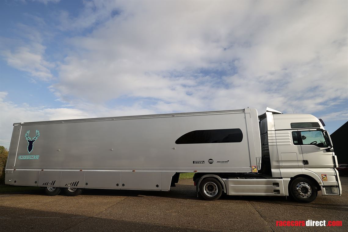 man-tgx-2-car-transporter-with-office-and-6m