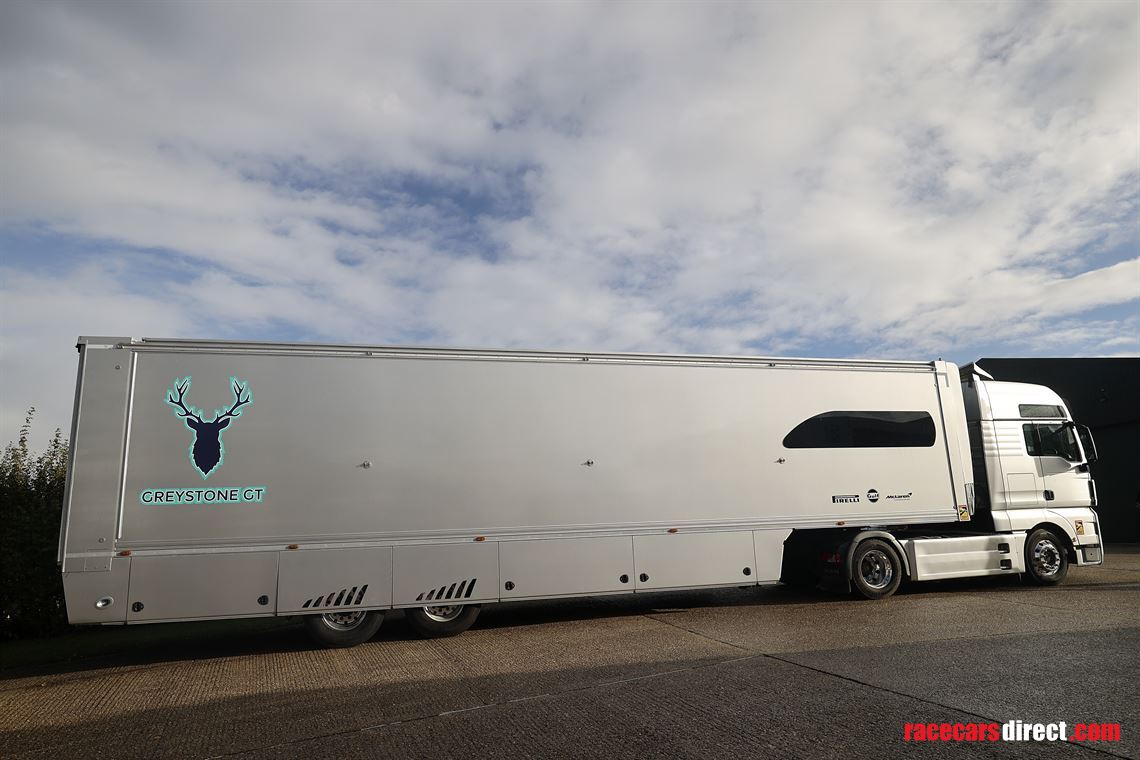 man-tgx-2-car-transporter-with-office-and-6m