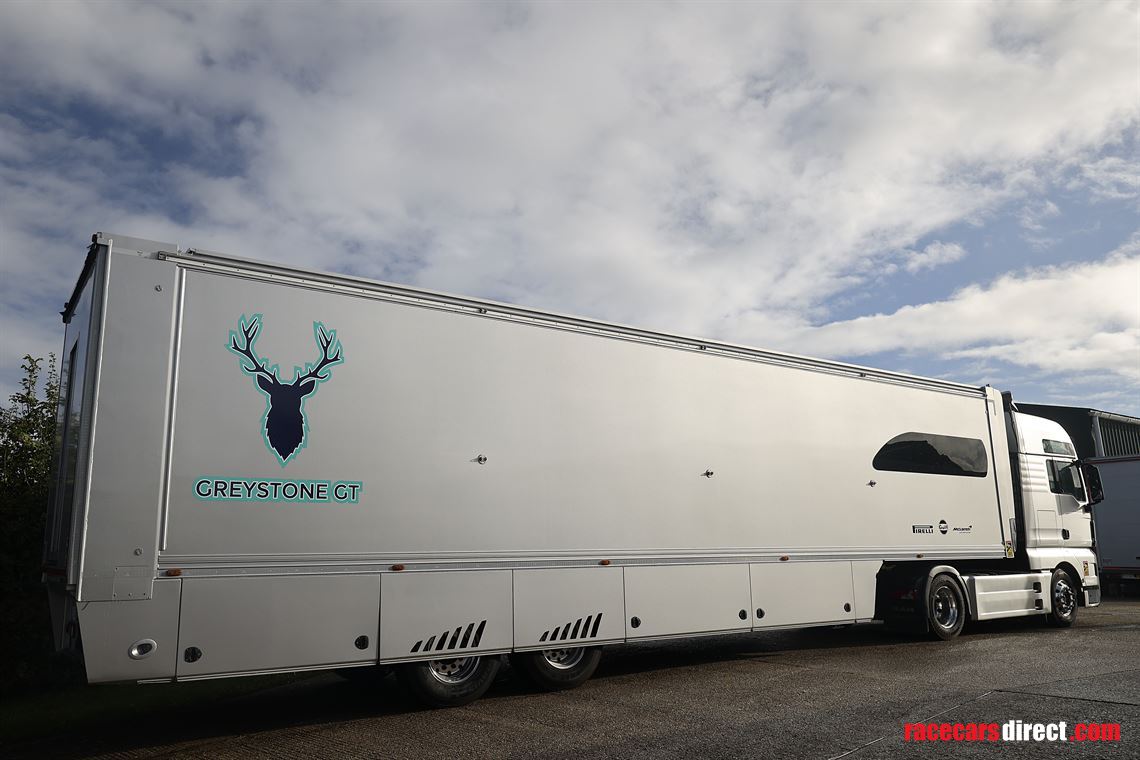 man-tgx-2-car-transporter-with-office-and-6m