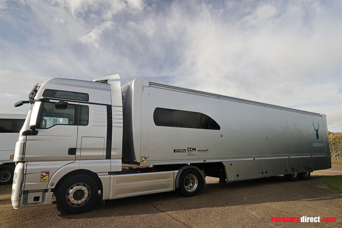 man-tgx-2-car-transporter-with-office-and-6m