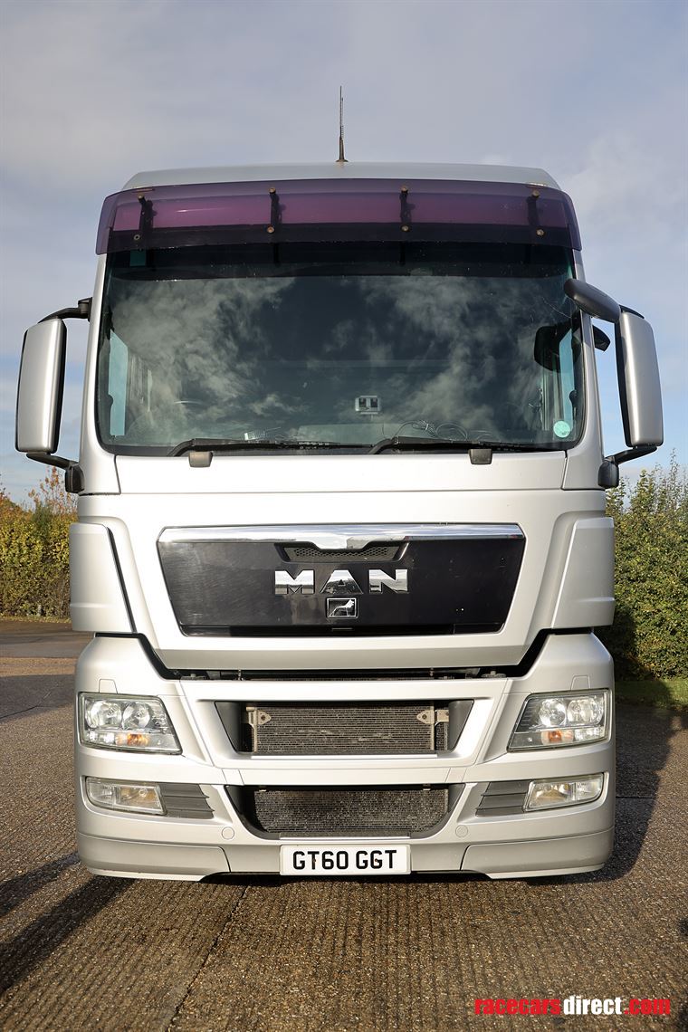 man-tgx-2-car-transporter-with-office-and-6m