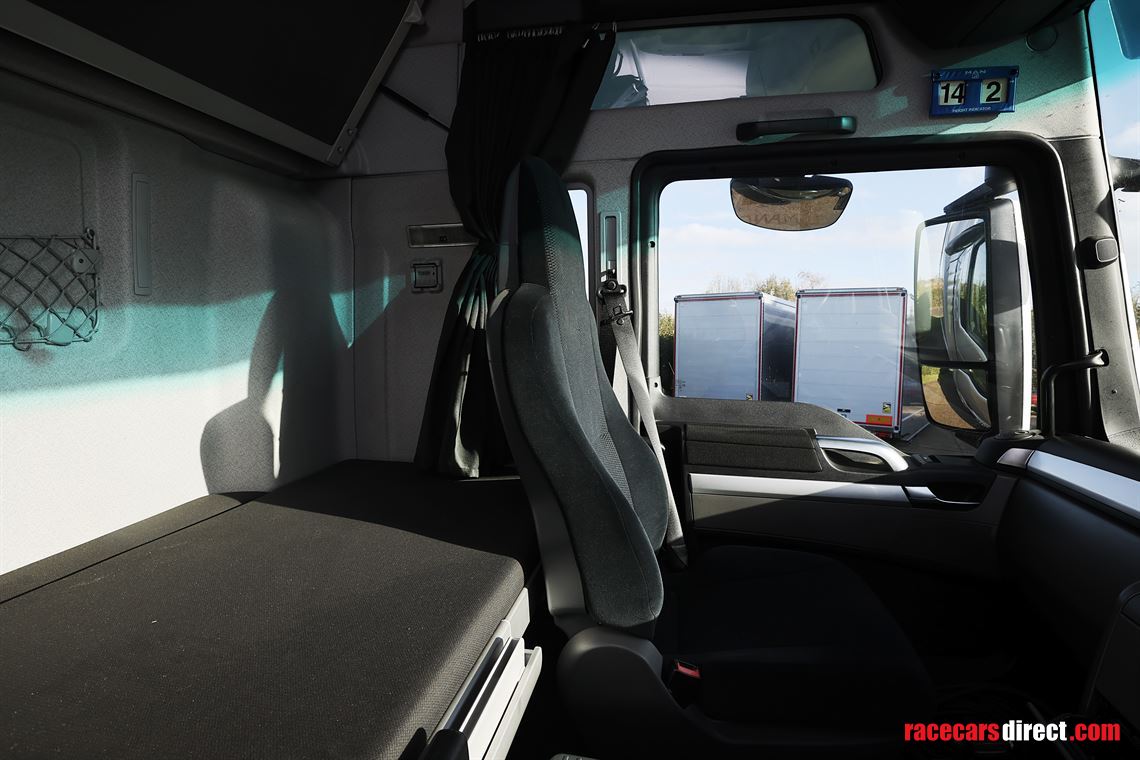 man-tgx-2-car-transporter-with-office-and-6m